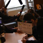 students preparing to film a movie