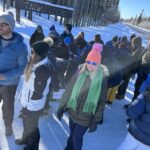 children standing in snow