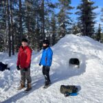 children standing in snow