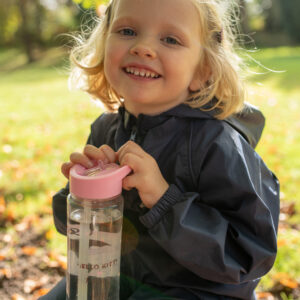 student holding a water bottle