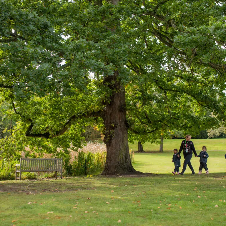 students walking with their teacher