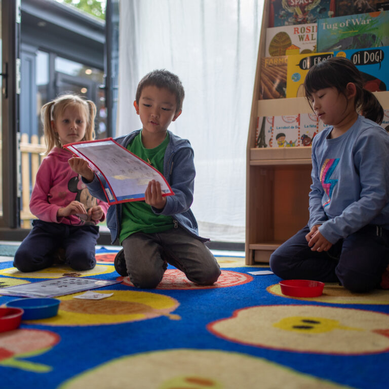 students reading to each other