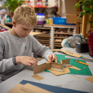 student making a model
